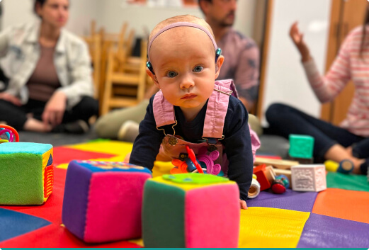 baby wearing device for hearing loss